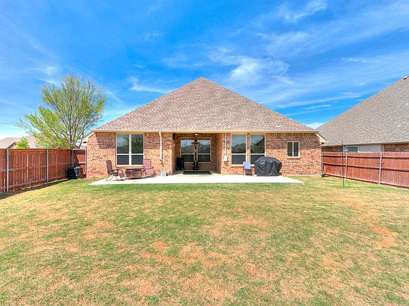 Huge backyard with extended patio, wired for a hot tub and outdoor TV