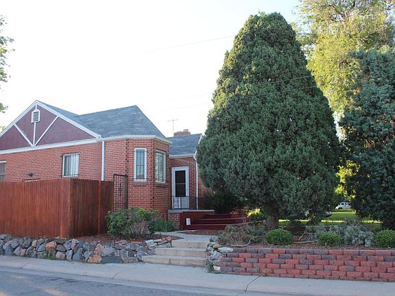 Brick home located on corner lot with additional street parking