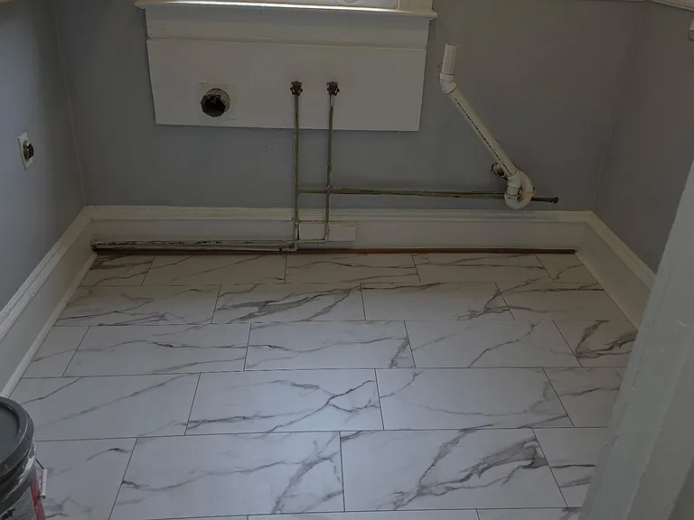 Laundry room with Washer dryer connection.