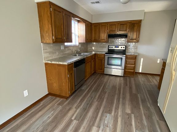 Kitchen, dining - plank flooring throughout main level