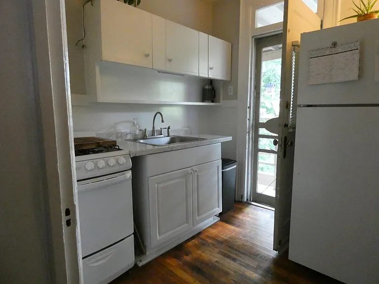 room in kitchen for a butcher block shelf set