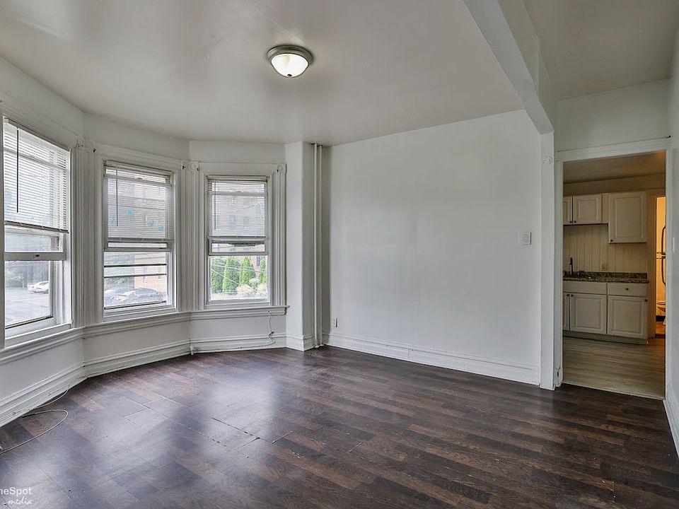 Living room facing kitchen