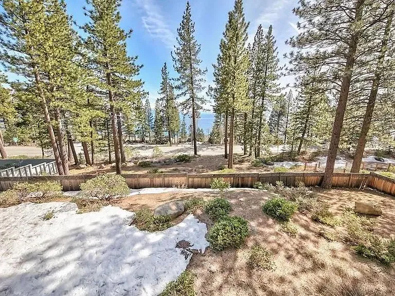 Half acre backyard overlooking the lake.