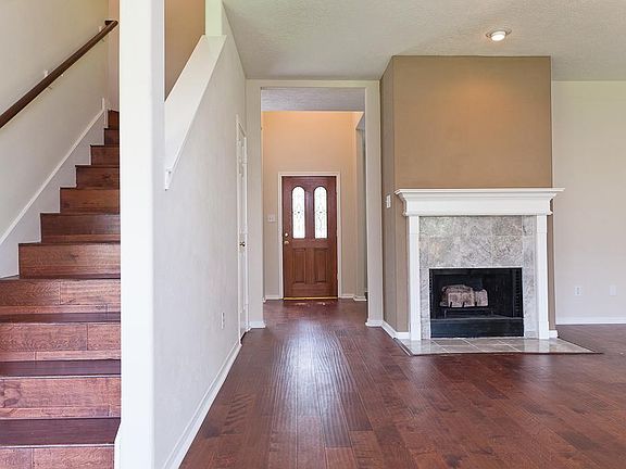 View of sold hardwoods stairs.