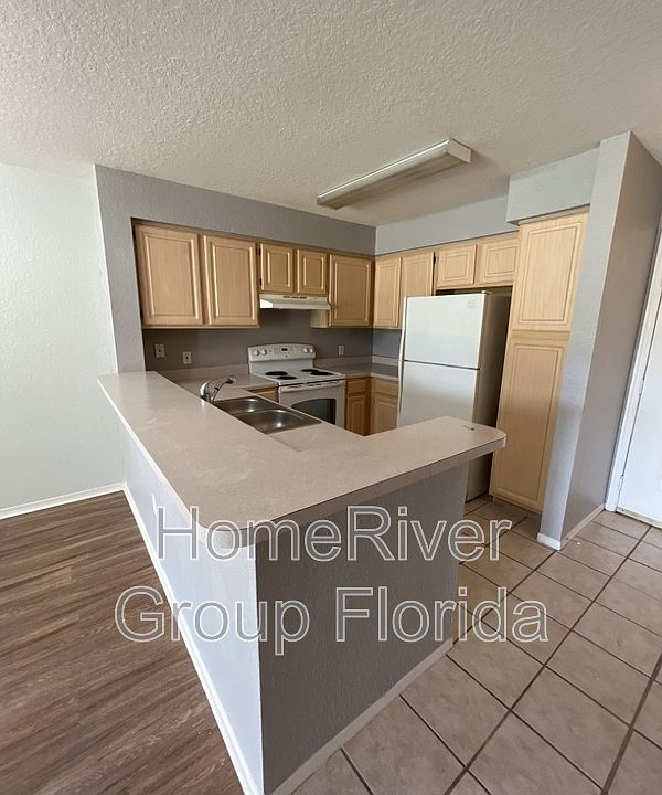 Audubon Villas At Hunters Creek Condominiums 13929 Fairway Island Dr