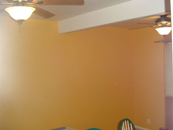 Fourth bedroom/Playroon view one. This room is 20'X11' and has two nice fans.