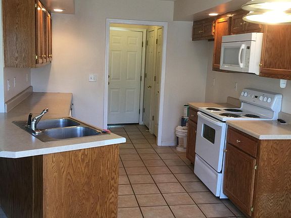 Kitchen, Two Pantries and door going to garage