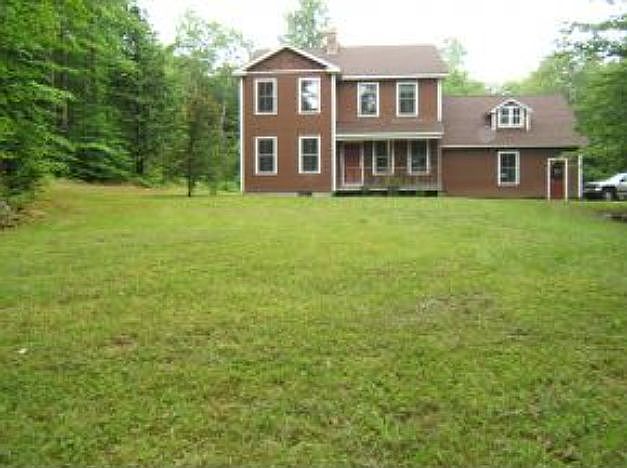 Front of house and garages