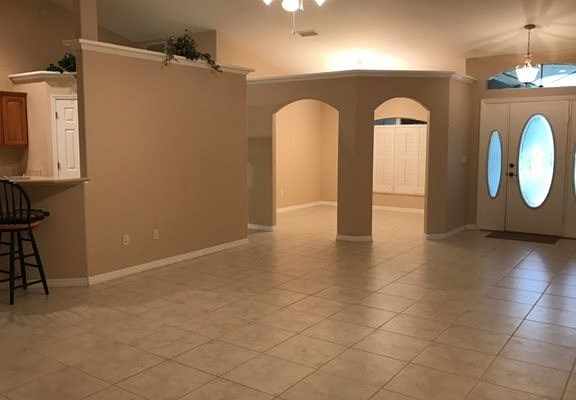Living Room with kitchen and dining room access