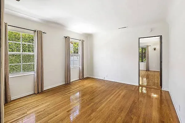 Bedroom 2 with hardwood floors