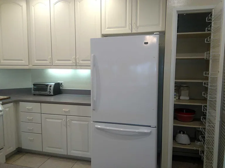 NOTE THE PANTRY PLUS A WALK IN STORAGE AREA WITH LAUNDRY