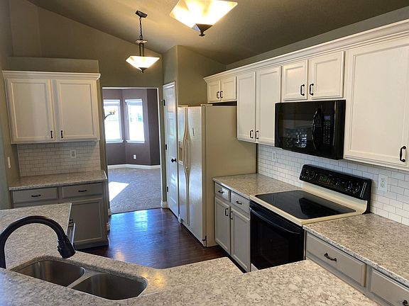 Kitchen with Quartz countertops.