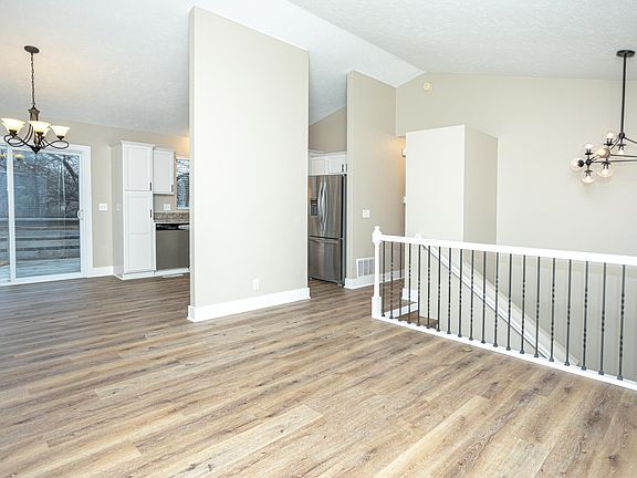 Main floor living area, dining area, and kitchen