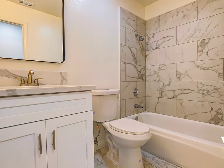 Apartment F: Upgraded Kitchen & Bathrooms