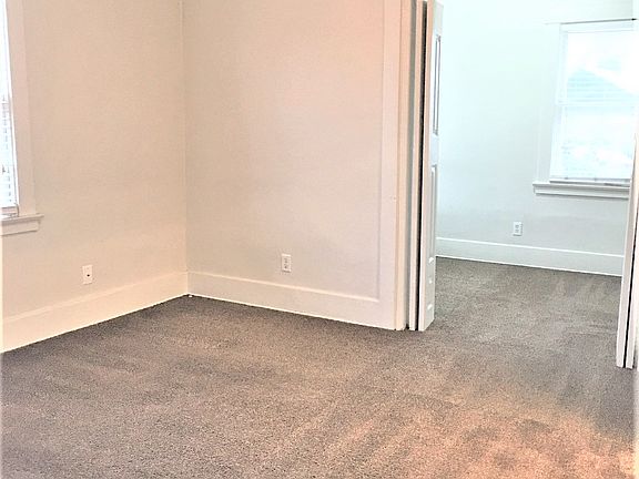 Living room looking into bedroom