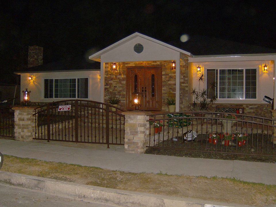 New stone/stucco/iron/cust lighting 