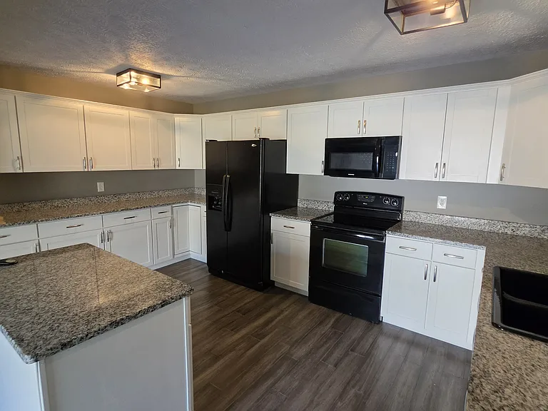 Kitchen, fully updated with granite counter tops.