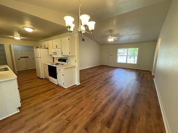Living Room/Dinning Room/Kitchen from entry to Master Bedroom