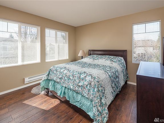 The bedroom has new planked laminate flooring, excellent natural lighting, and is nicely sized.  