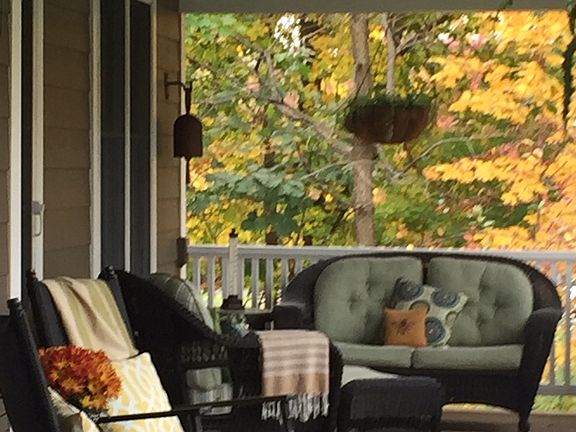 Enjoy evenings on the IPE wood front porch that runs the full length of the home.