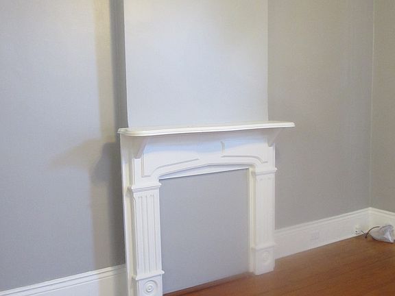 original solid wood mantles, doors and hardwood floors throu