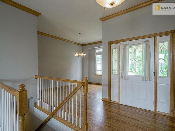Hardwood floor entry welcomes you into this crisp, clean, move-in ready home