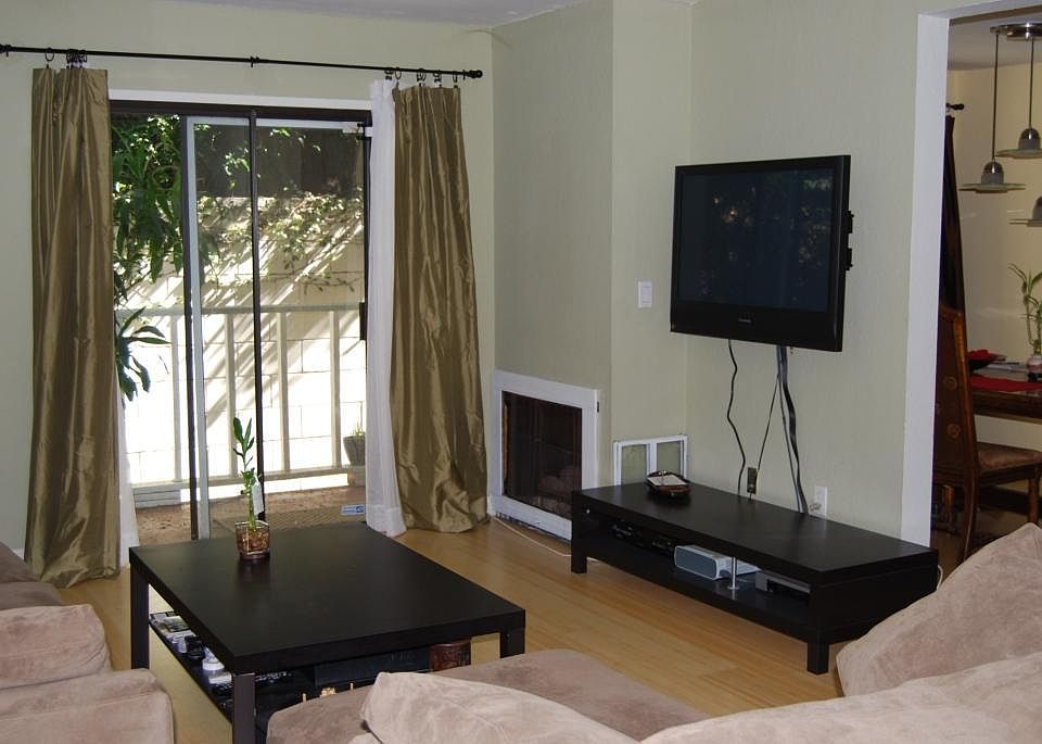 Living room, access to patio