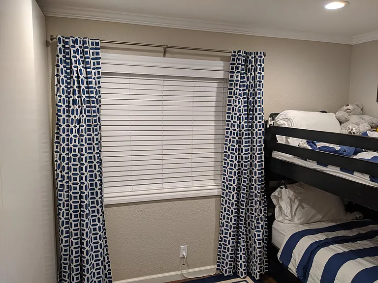 Third bedroom. Walled closets on the left with sliding doors.