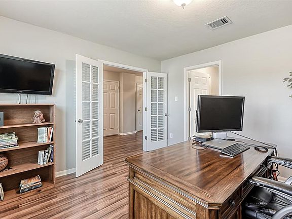 Your own private office with French doors right off the entryway!