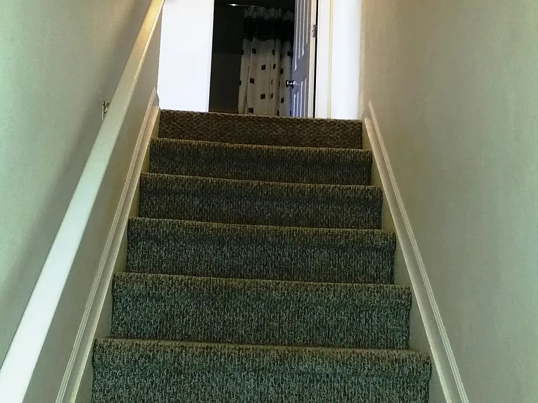 Stairs to Bedrooms & Full Bath at top