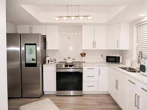 5th image of 6301 58TH STREET N #402