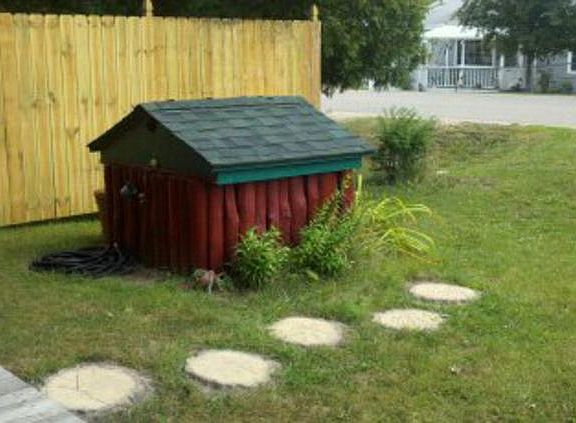 even the well house is log