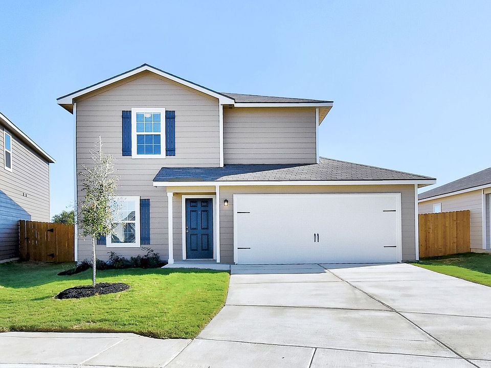 The Beech Plan has gorgeous curb appeal with a covered front entryway and charming shutters.