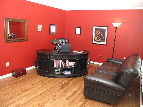 Den: Glass French Doors off of the Front Entry lead you into the large ML Den.