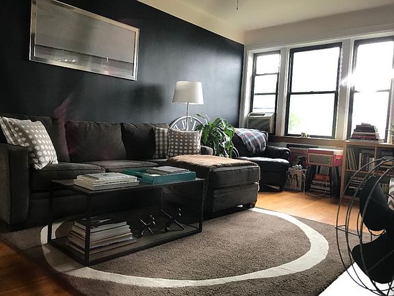 Living room with north views of the Hudson River