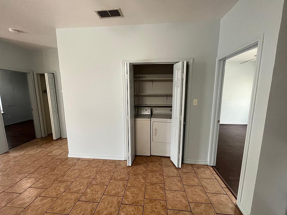 Washer/Dryer connections in utility closet.