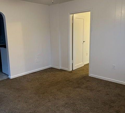 from the front door looking into living room towards bedroom