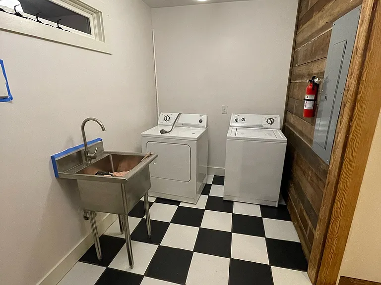 Laundry and mudroom with utility sink