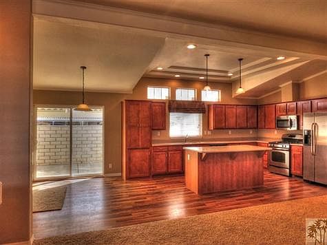 Great curb appeal. Attached two car garage  patio and landscaped in front.