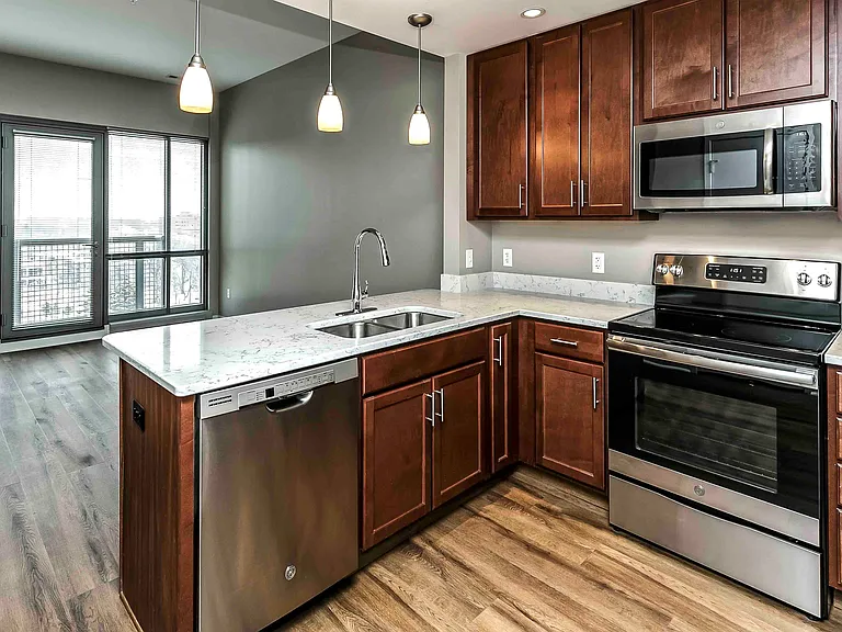 Sleek appliances and plenty of cabinet storage adorn our kitchens.