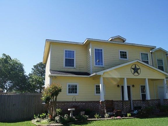 Spacious front yard. Plenty of natural light. Brick front. Front porch with columns.