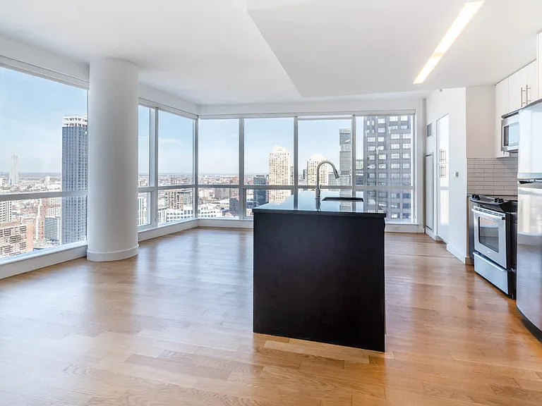 Kitchen and Living Room with Floor to Ceiling Windows