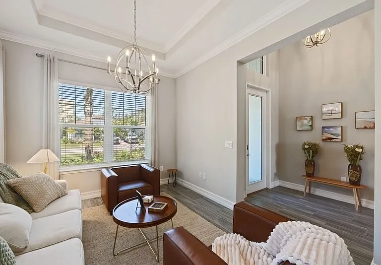 Front sitting room with sofa bed.