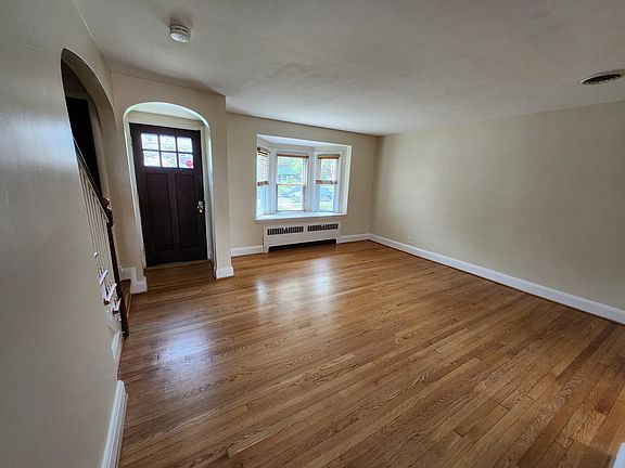 Living room, fresh paint and newly refinished floors
