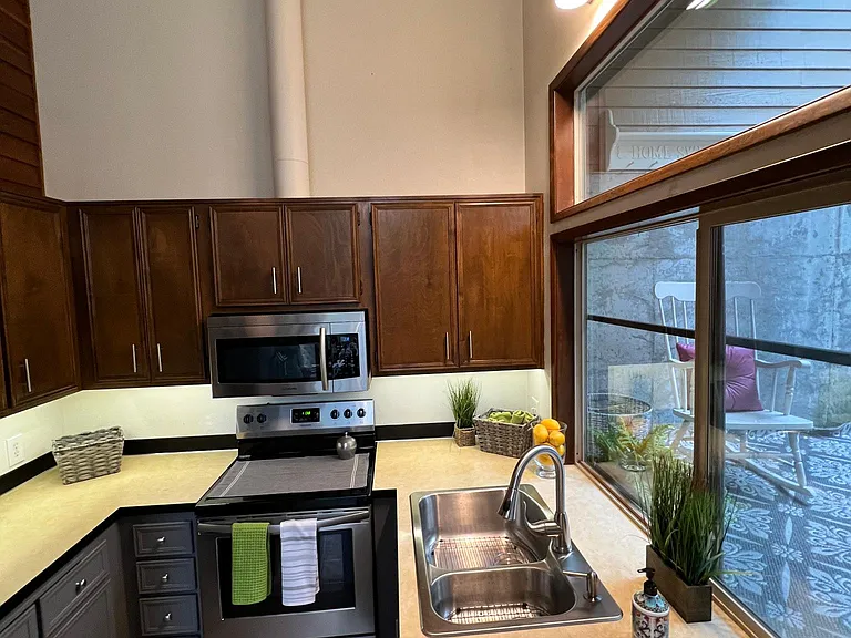 Efficient kitchen design with LED countertop lighting.