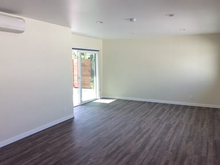 NEW LVP WOOD GRAIN SYLE HARD FLOORING.
