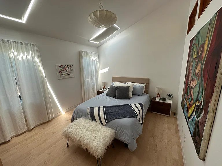 Large guest bedroom, queen size bed (new), skylights, built in closet