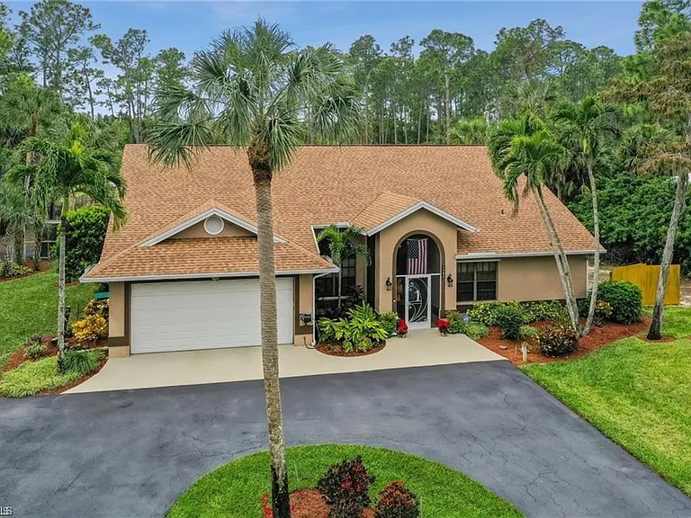 5980 Hidden Oaks Ln — Photo 2