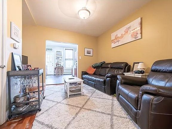 Living Room looking toward kitchen - Color is now light grey