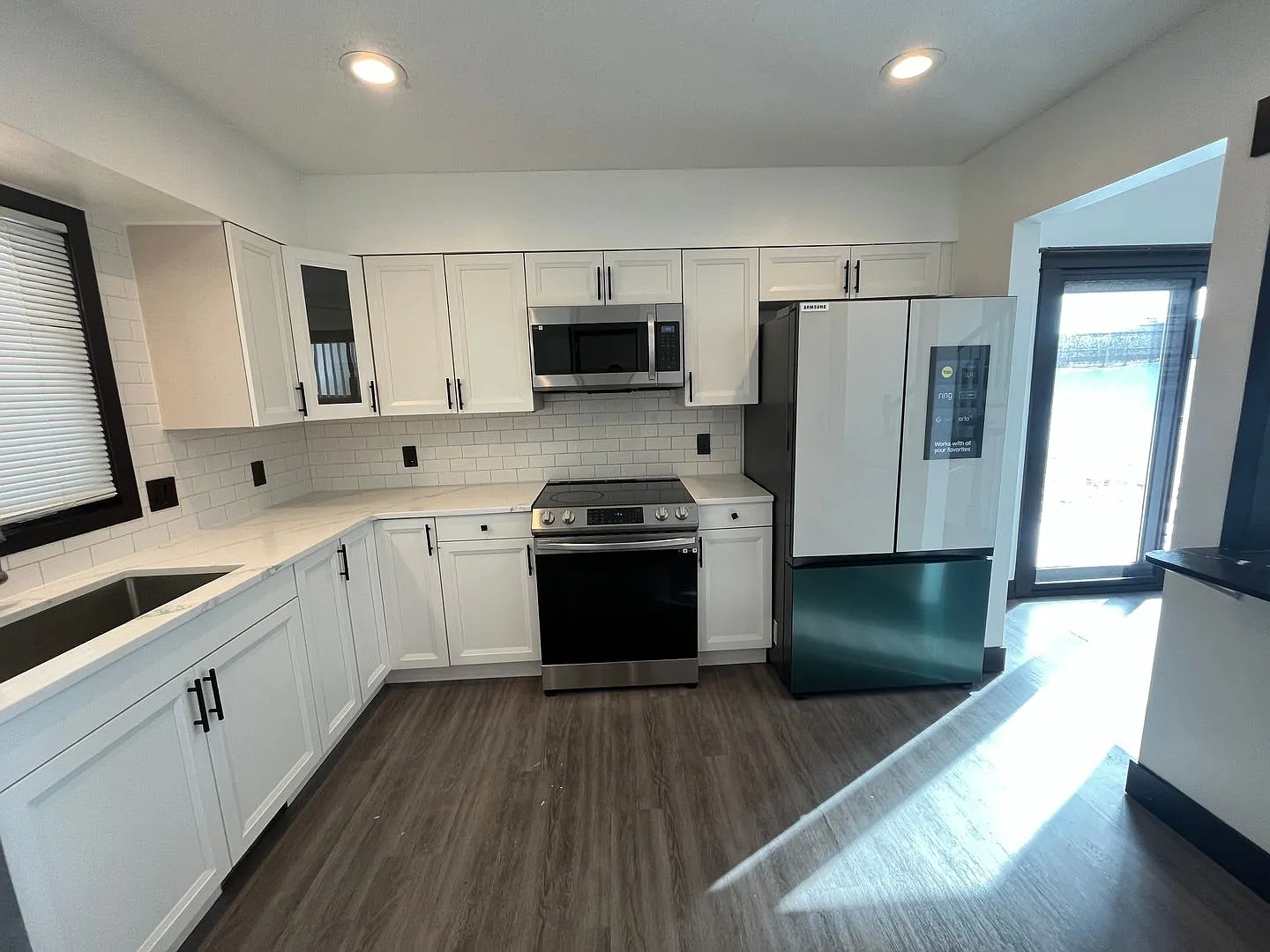 Updated Kitchen, carpet and freshly 3 bedroom / 2 bath home is right off Hwy 169 and Anderson Lak... — Photo 3